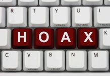 VIRAL Hoax Targets Election System – BUSTED! Close-up of a computer keyboard with the word HOAX spelled out in red keys