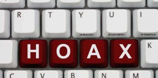 VIRAL Hoax Targets Election System – BUSTED! Close-up of a computer keyboard with the word HOAX spelled out in red keys