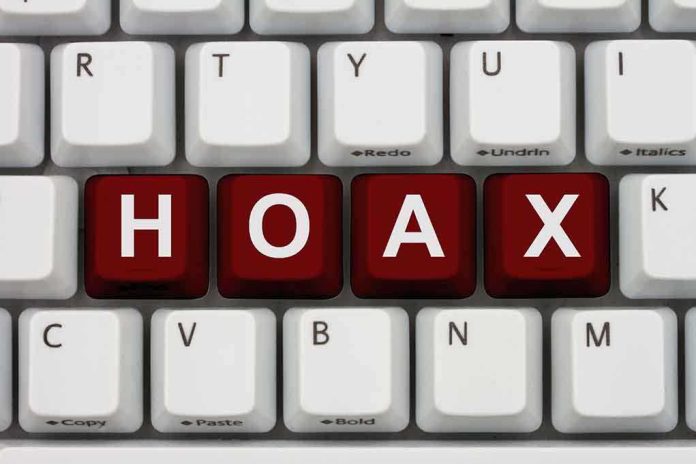 Close-up of a computer keyboard with the word HOAX spelled out in red keys