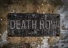 Death Row EXONERATION – Victims Family Demands Release Weathered Death Row sign on aged concrete wall