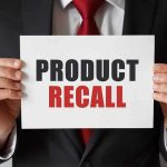 URGENT Recall Announced: Customers Ordered to DESTROY Product! Product Recall sign held by person in suit.