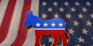 Dems Fundraising Scandal – Where’s The Money? A donkey symbol representing the Democratic Party in front of an American flag background