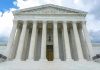 SCOTUS Ruling Supercharges GOP Seat Power Grab Building with columns under a cloudy sky.
