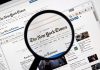 New York Times SUES Pentagon – Sparks Legal War Magnifying glass over The New York Times website.