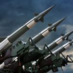 Precision Strike Bombs FLOOD Canadian Military Array of missile launchers positioned against a dramatic sky