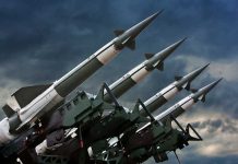 Precision Strike Bombs FLOOD Canadian Military Array of missile launchers positioned against a dramatic sky