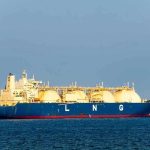 LNG tanker ship sailing on open sea.