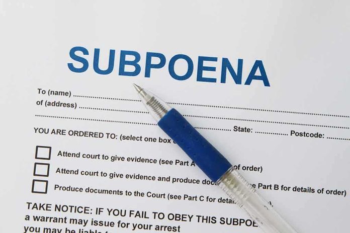 A subpoena document with a blue pen resting on it