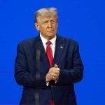 Rogue President Goes First – Joins Trump’s Unorthodox Peace Plan Man in a suit with a blue background.