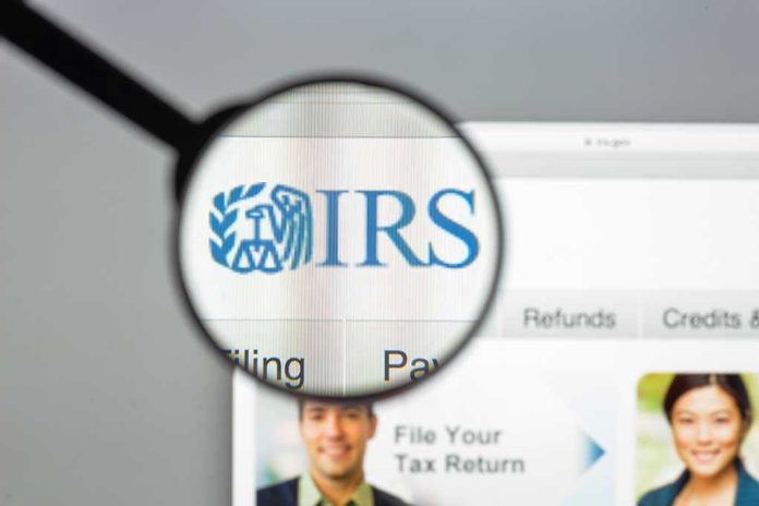 Magnifying glass over IRS website.