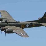 AI Drone Swarms Overtake Traditional Warfare Boeing B-17 flying against a clear blue sky