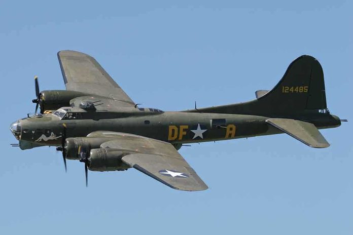 Boeing B-17 flying against a clear blue sky