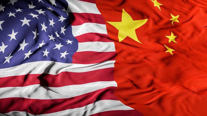 United States flag merged with China flag.