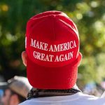 100% Approval: Has This Ever Happened Before? Person wearing a red Make America Great Again hat.