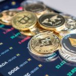 Massive Bitcoin Wallet Moves: What’s Really Happening? Cryptocurrency coins on a trading screen background.