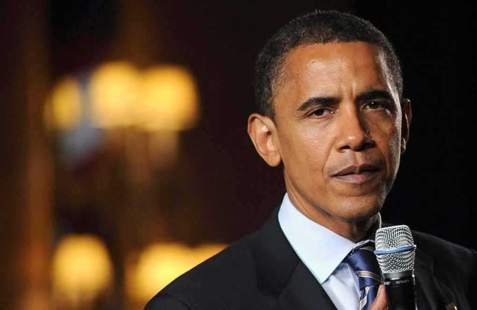 Individual speaking into a microphone at an event