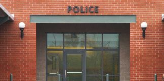 Livestreamed Attack: Disturbing Real-Time Massacre Entrance of a modern police station with brick facade