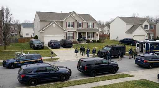 shutterstock_2755604603 FBI agents conducting an operation in a suburban neighborhood