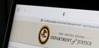 DOJ Flip-Flop Fuels China Fears Close-up of the U.S. Department of Justice website on a computer screen