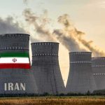 Leader Gone, Revenge Promised—Brace nuclear power plant cooling towers in Iran at sunset