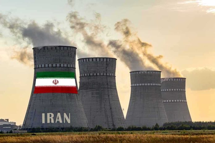 shutterstock_1590729430 nuclear power plant cooling towers in Iran at sunset