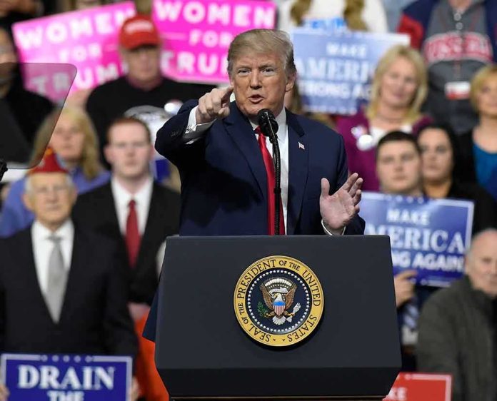 shutterstock_1046190946 politician speaking at a rally podium