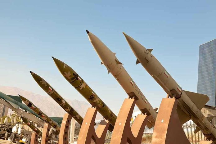 shutterstock_1516796117 Row of surface-to-surface missiles mounted on display stands outdoors