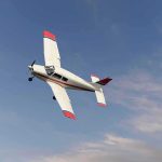 Single-engine airplane banking in a clear sky