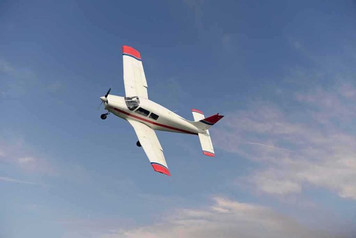 Single-engine airplane banking in a clear sky