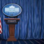 Fifth Amendment Showdown: Fauci vs. Senate White House press briefing podium with U.S. flag and blue curtain