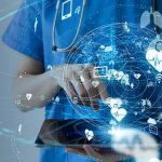 Nurses Go Political — Ethics Demand It Healthcare professional using a digital tablet with medical data icons