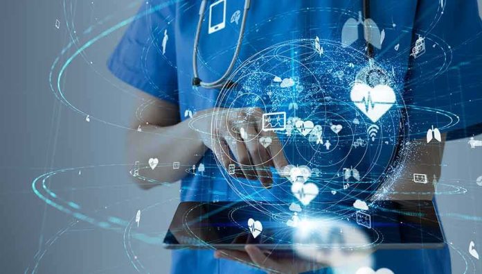 Healthcare professional using a digital tablet with medical data icons