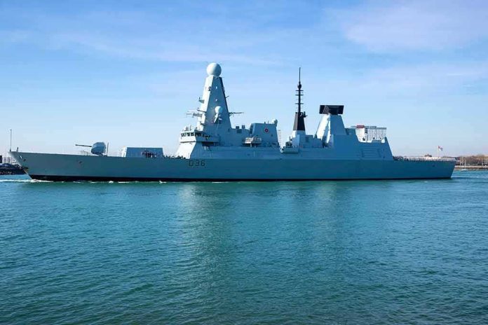 naval destroyer sailing in calm harbor waters