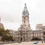 Religious Showdown: Courts vs. Minister Philadelphia City Hall with a cloudy sky in the background