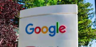 Google Dodges Axe, Keeps The Stack Google and YouTube logos on an outdoor office sign