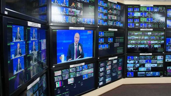 shutterstock_1430366228 broadcast control room wall of monitors