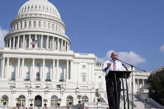 shutterstock_154755434 Louie Gohmert speaking at a podium outside the U.S. Capitol