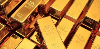 Gold bars stacked closely together