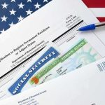 Sweden’s Warning to America: Permanent Asylum Isn’t Sustainable immigration forms with green card and social security card on US flag background