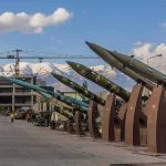 Trillion-Dollar Golden Dome—Taxpayer ALERT! Row of missiles on display outdoors