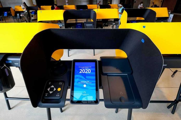 Voting booth with touchscreen ballot machine