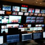 Commuter Chaos: 3,500 Workers Shut Down NYC Rail control room with multiple screens and monitors