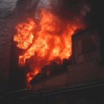 Ancient Monastery Ablaze After Massive Barrage Building engulfed in flames at night