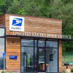 Elderly Scam Victims Betrayed by Federal Inspector Exterior view of a modern United States Post Office building surrounded by greenery