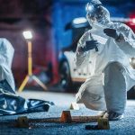 Backyard Stash Turns Into War Zone forensic investigators at nighttime crime scene