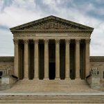Supreme Court building with grand columns and steps