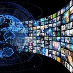Mass Pardons, Bigger Bills—Now 2028? Digital globe with curved wall of multimedia screens