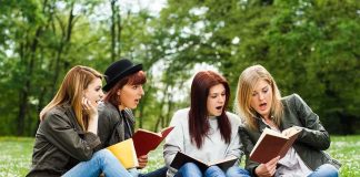 Marriage-First App Disrupts Hookup Culture Group of young women reading books on grass in a park