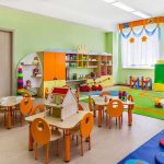 Preschool classroom with colorful furniture and toys