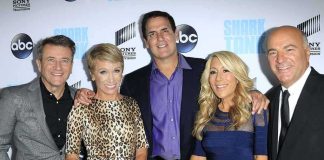 Robert Herjavec, Barbara Corcoran, Mark Cuban, and Lori Greiner posing together at an event